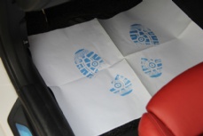Paper floor mat coated film